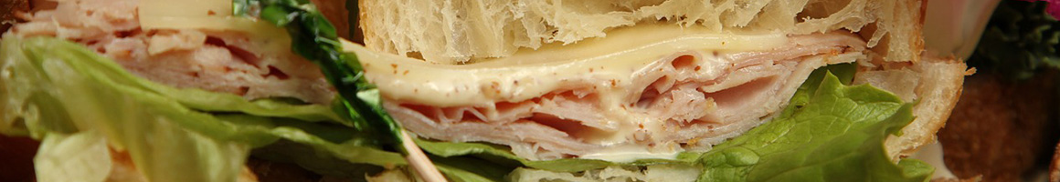 Eating Italian Sandwich at Cortina's Orange restaurant in Orange, CA.